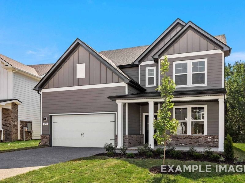Front exterior of a new home in Woods Crossing, Gallatin, TN, highlighting curb appeal (Image 26).