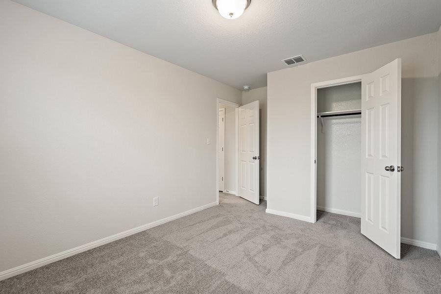Photos are of a completed model of the same floor plan and are for illustrative purposes only. Actual home is under construction and design selections, materials, and features may differ. Confirm final specifications with the New Home Consultant.