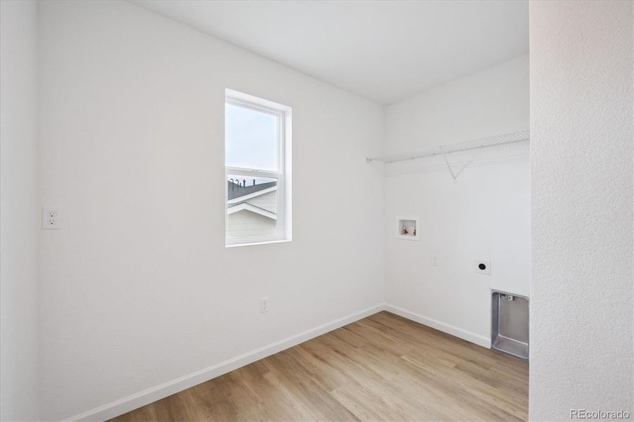 Spacious, unfurnished interior of a new home in Fossil Creek, Windsor (Image 17).