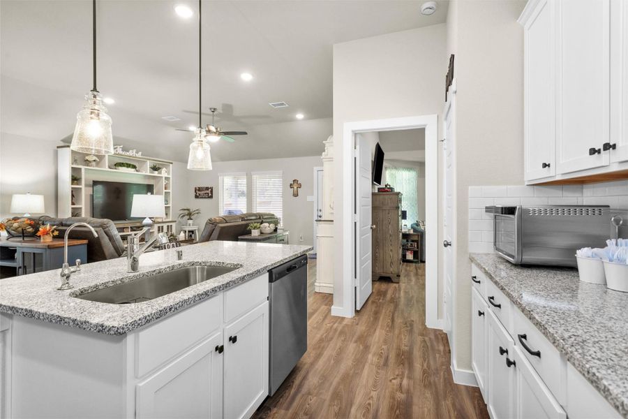 You will never feel left out of the fun doing dishes in this kitchen. The Farmhouse sink is perfectly placed to make even doing dishes fun. You will never feel left out of the fun doing dishes in this kitchen. The Farmhouse sink is perfectly placed to make even doing dishes fun.