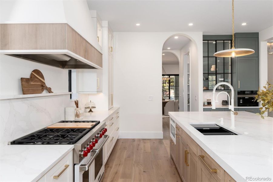 Custom hood with fluted accent Custom hood with fluted accent