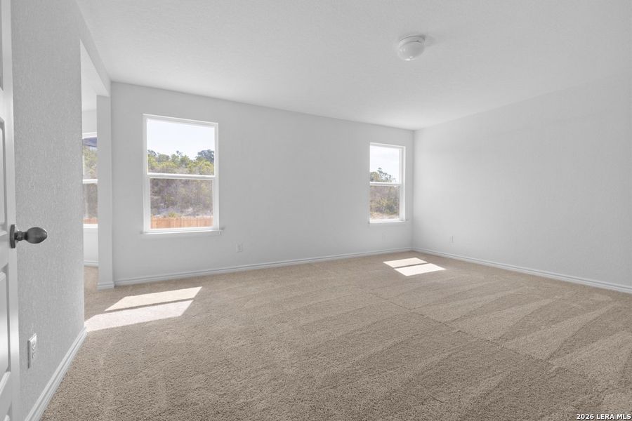 Spacious, unfurnished interior of a new home in Hidden Bluffs at TRP, San Antonio (Image 14).