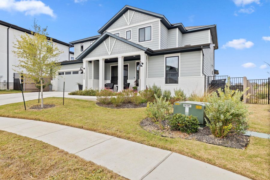 Front exterior of a new home in , Austin, TX, highlighting curb appeal (Image 22).