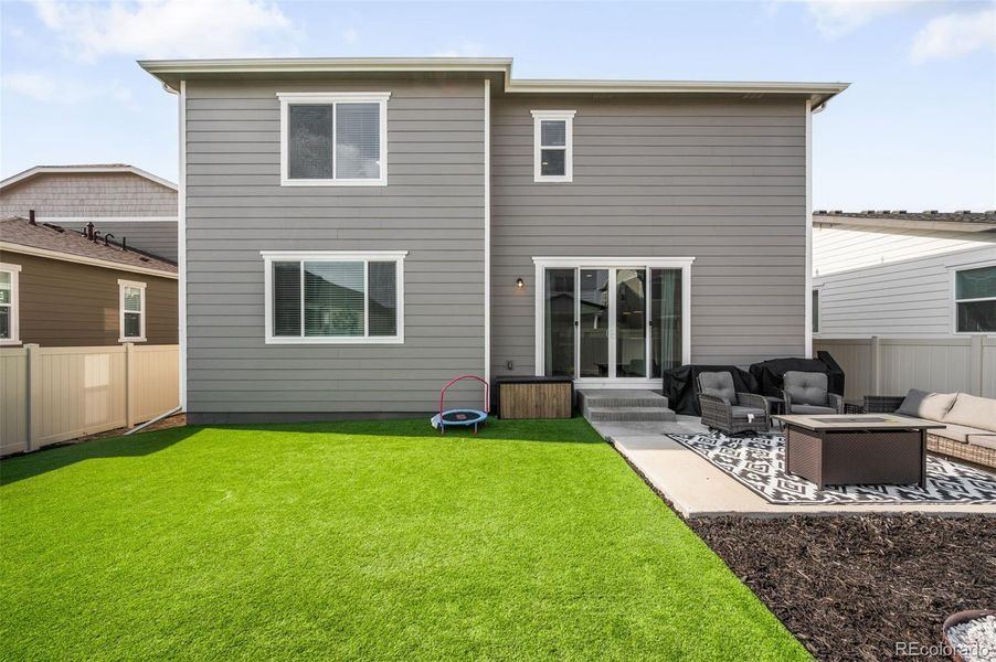 Exterior details and patio area of a home in Thompson River Ranch, Johnstown (Image 20).