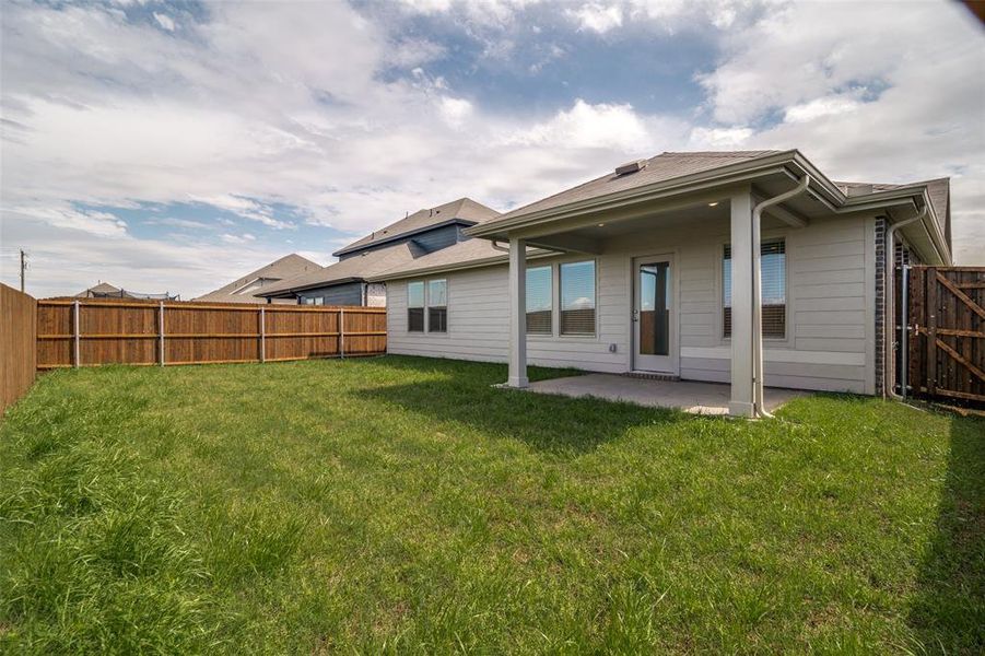 Exterior details and patio area of a home in River Ridge, Crandall (Image 3).