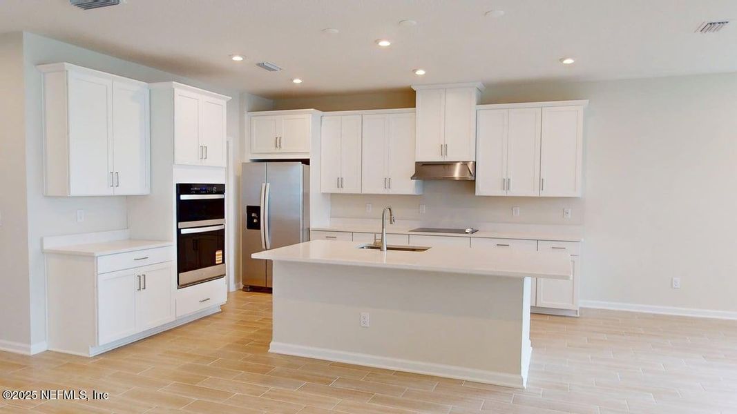 Furnished interior view inside a new home in Lakes at Bella Lago, Green Cove Springs (Image 8).