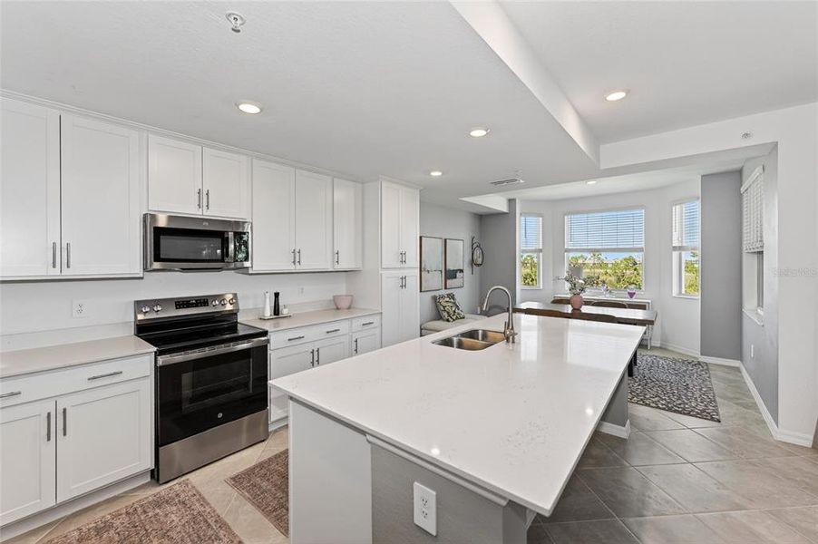 Furnished interior view inside a new home in Wellen Park Golf & Country Club, Venice (Image 14).