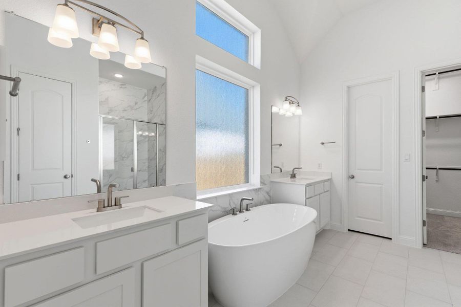Primary Bath retreat with dual vanities & soaking tub