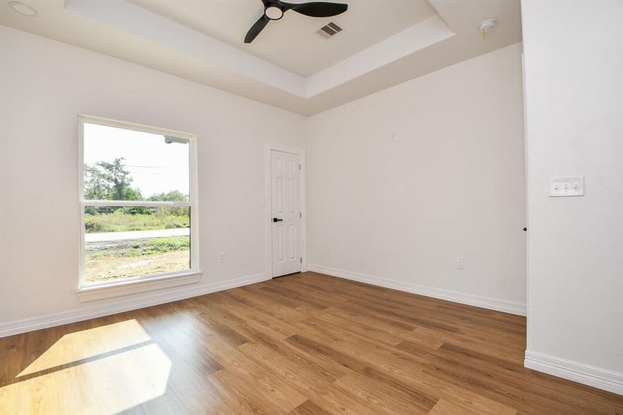 This bedroom offers plenty of room, so you can arrange your furniture just how you like it. Enjoy personalizing the space!