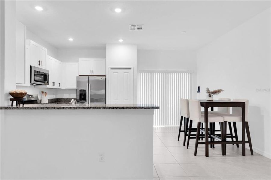 Furnished interior view inside a new home in , New Port Richey (Image 1).