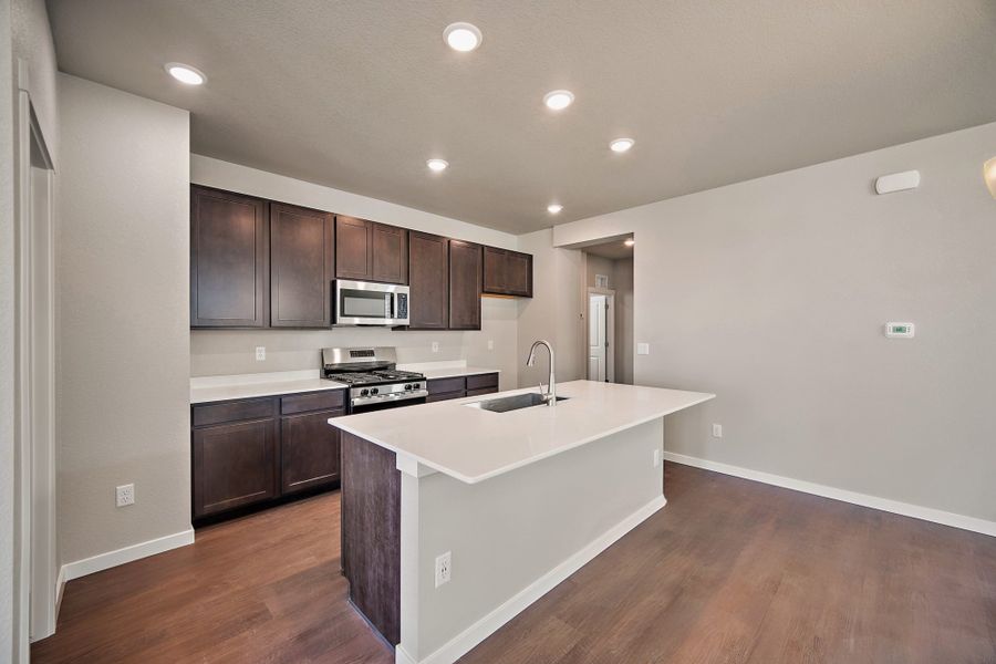 Furnished interior view inside a new home in Ridge at Lorson Ranch, Colorado Springs (Image 6).