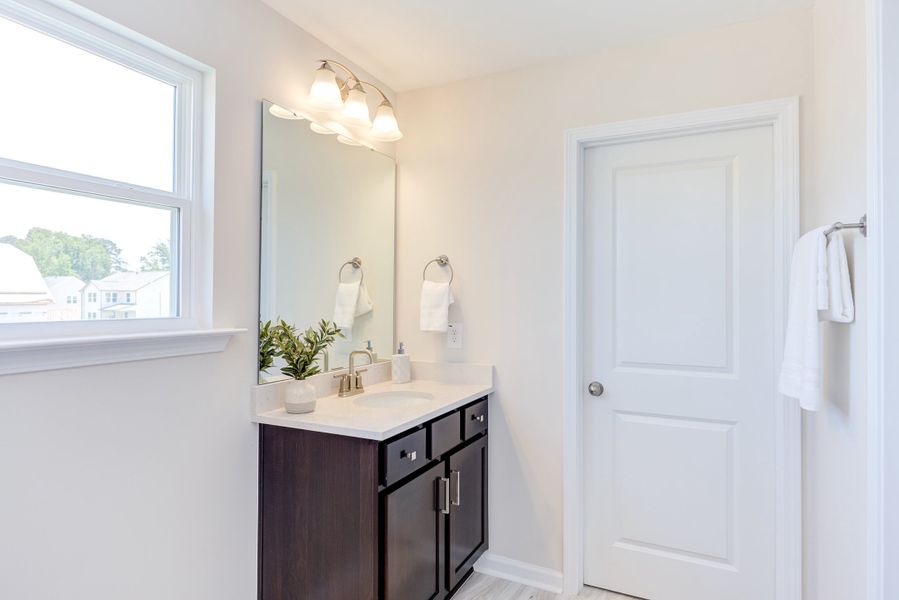 Representative furnished interior of a home built from the The Poppy by Chesapeake Homes in The Willows, Loris (Image 36).