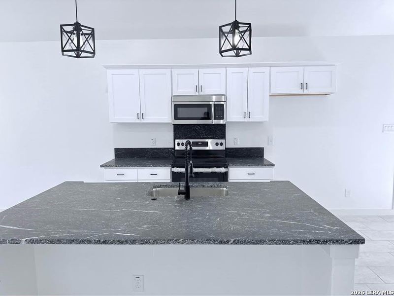 Furnished interior view inside a new home in , Devine (Image 3).