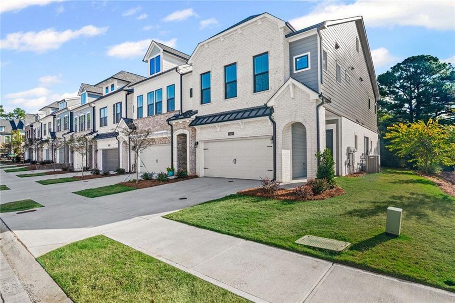Front exterior of a new home in , Alpharetta, GA, highlighting curb appeal (Image 31).