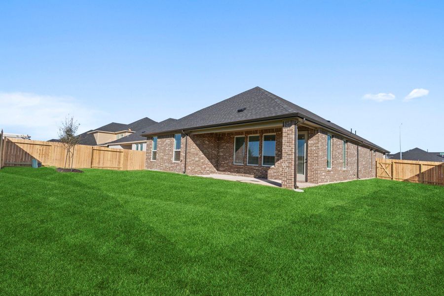 Exterior details and patio area of a home in Alexander, Pearland (Image 2). Exterior details and patio area of a home in Alexander, Pearland (Image 2).