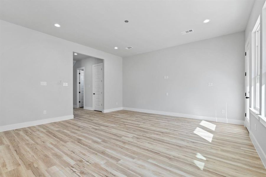 Unfurnished room featuring light hardwood / wood-style floors