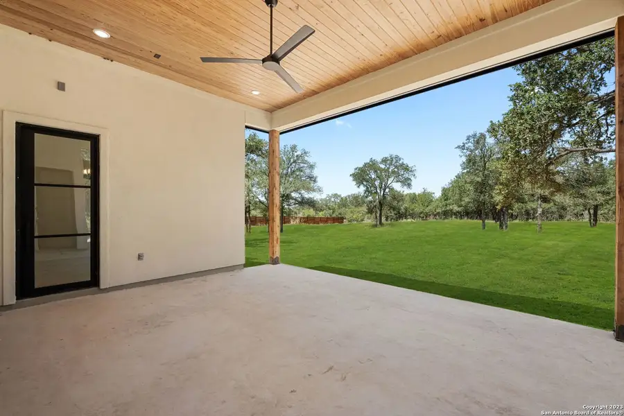Exterior details and patio area of a home in , Castroville (Image 3).