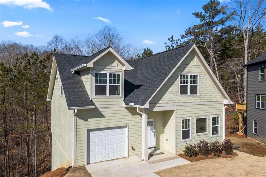 Front exterior of a new home in , Douglasville, GA, highlighting curb appeal (Image 1). Front exterior of a new home in , Douglasville, GA, highlighting curb appeal (Image 1).