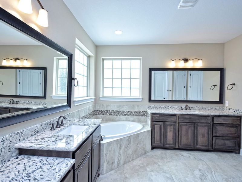 Representative furnished interior of a home built from the Madera II by Giddens Homes in Scofield Farms Estates, Georgetown (Image 245).