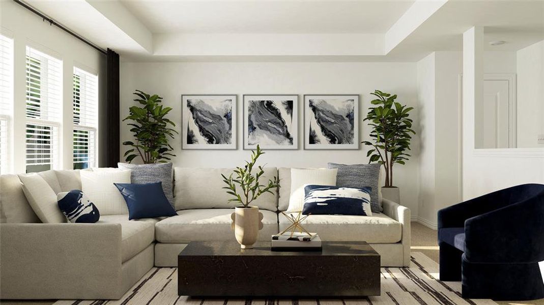 Living room featuring a tray ceiling