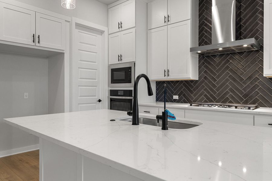 Furnished interior view inside a new home in Heritage, Dripping Springs (Image 17).