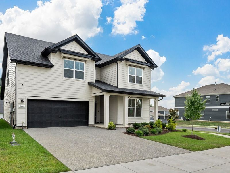 Front exterior of a new home in Carellton, Gallatin, TN, highlighting curb appeal (Image 26).