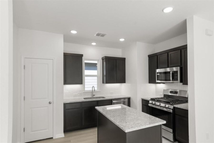 Furnished interior view inside a new home in Trace, San Marcos (Image 12).