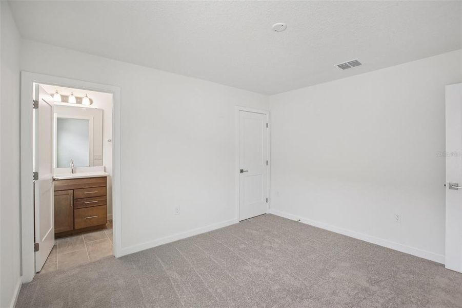 Spacious, unfurnished interior of a new home in Grasslands West, Lakeland (Image 19).