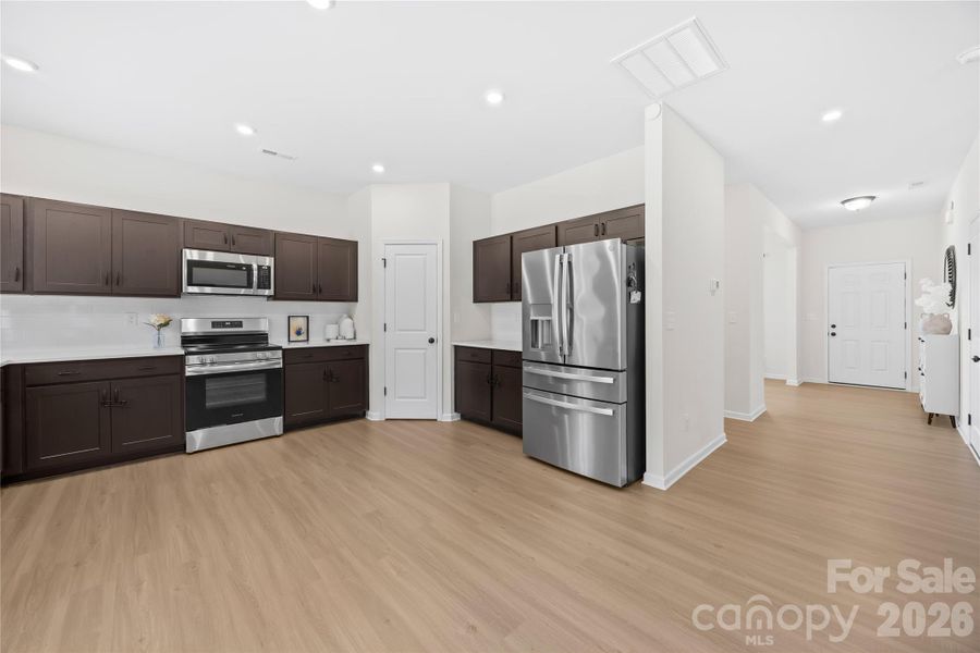 Furnished interior view inside a new home in Orchard Creek, Charlotte (Image 18).