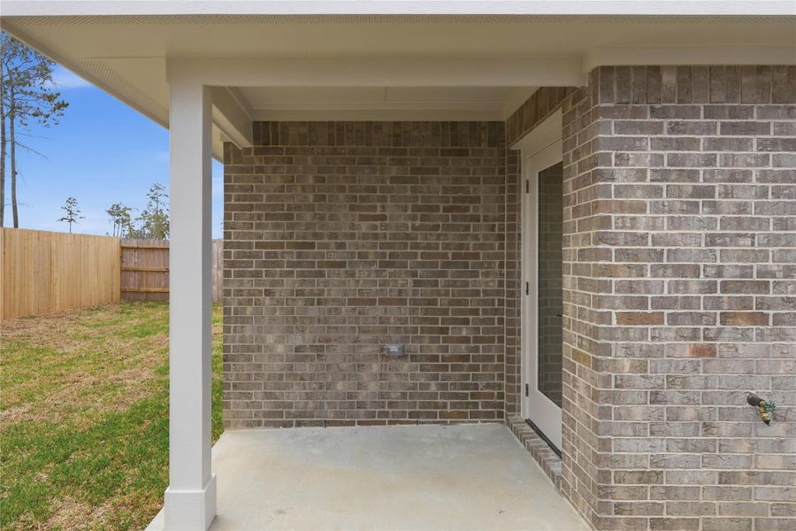 Exterior details and patio area of a home in Grand Oaks Reserve, Cleveland (Image 3).
