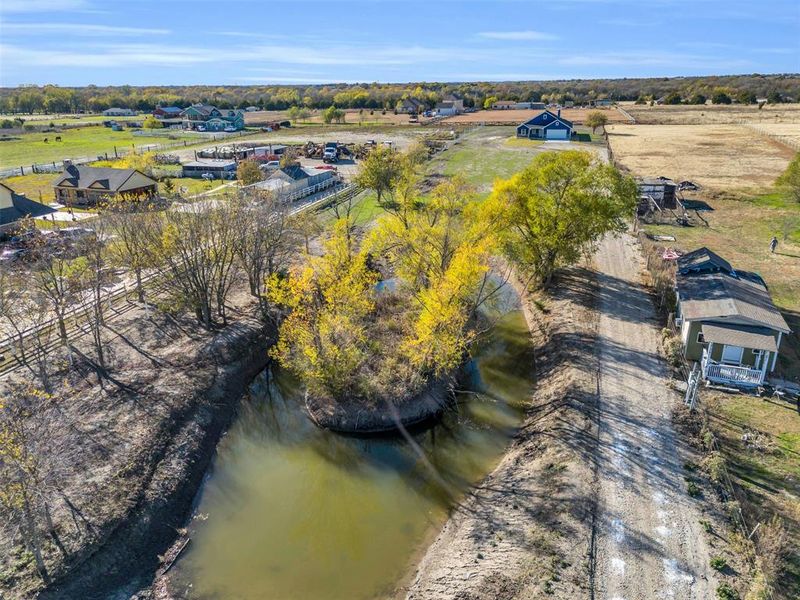 Aerial view with a rural view and a water view