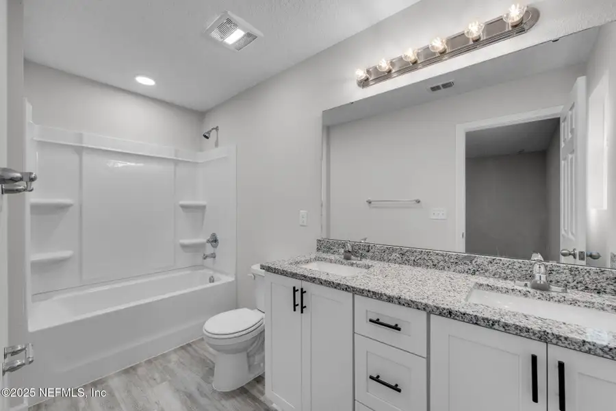 Furnished interior view inside a new home in , Jacksonville (Image 15). Furnished interior view inside a new home in , Jacksonville (Image 15).