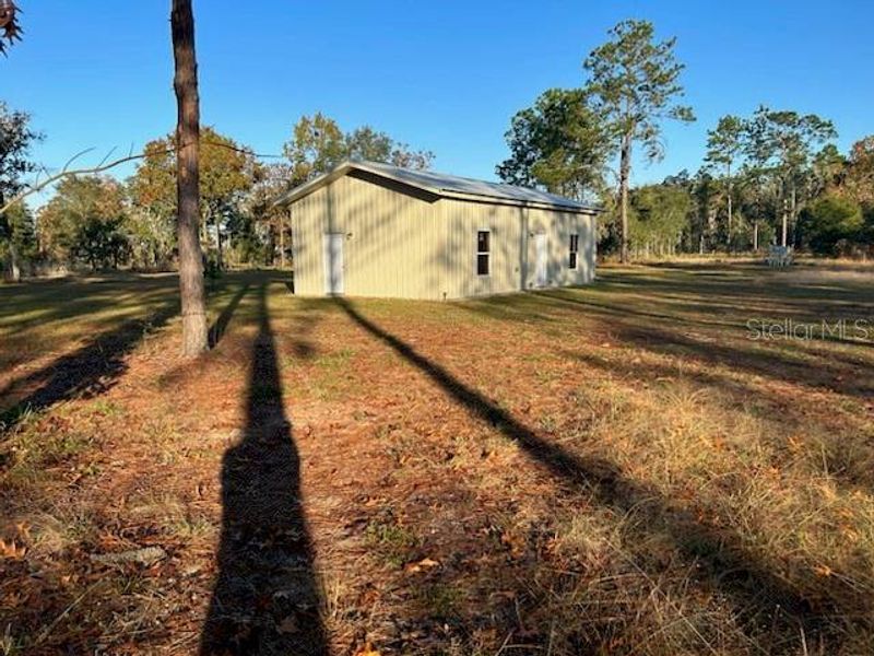 Exterior details and patio area of a home in , Williston (Image 2).