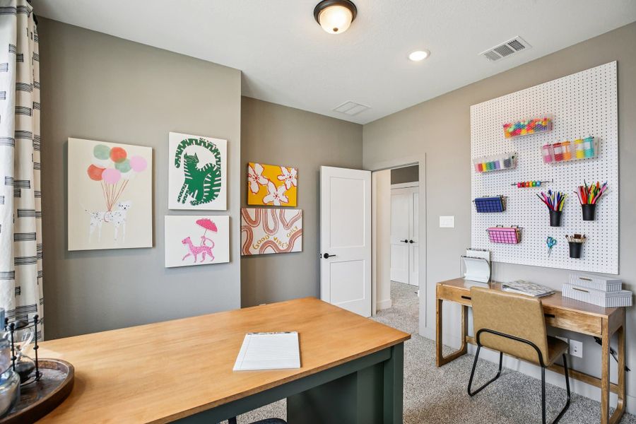 Furnished interior view inside a new home in Bridgeland, Cypress (Image 32).