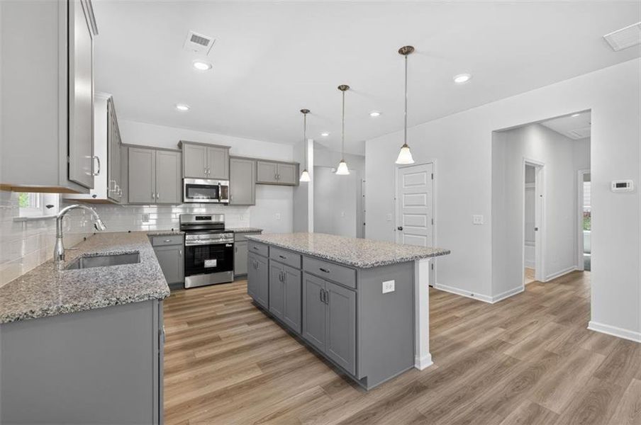 Furnished interior view inside a new home in Summerfield Place, Carrollton (Image 4).