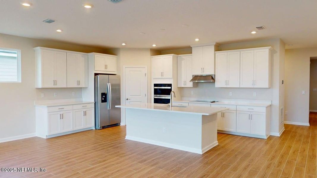 Furnished interior view inside a new home in Lakes at Bella Lago, Green Cove Springs (Image 6). Furnished interior view inside a new home in Lakes at Bella Lago, Green Cove Springs (Image 6).