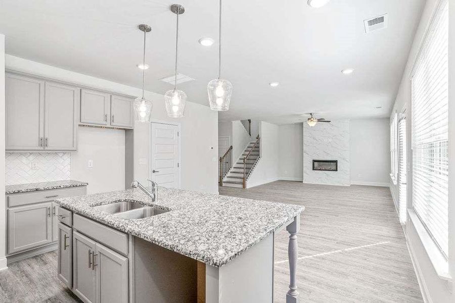 Furnished interior view inside a new home in Waters Edge, Mansfield (Image 8).