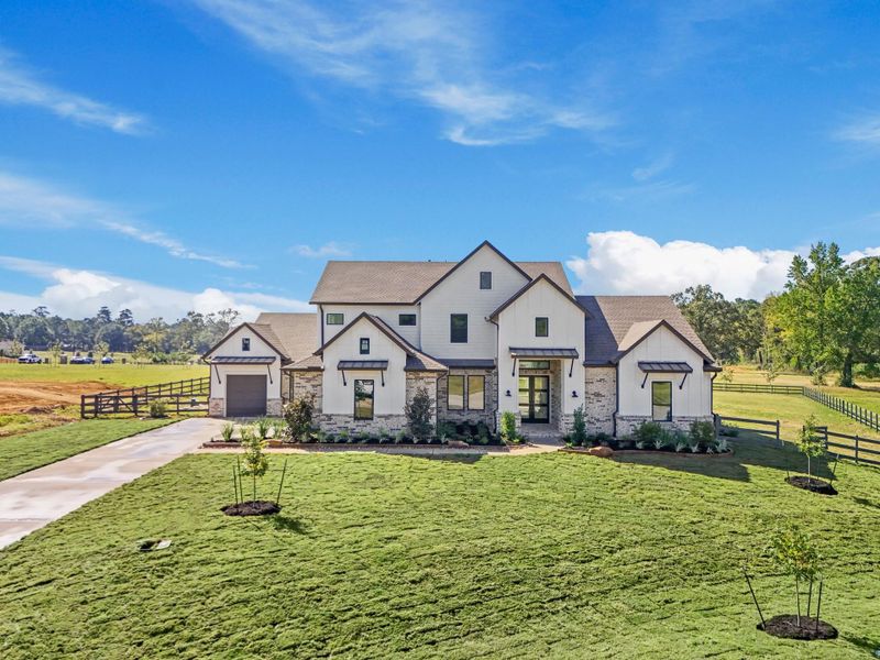 Front exterior of a new home in Bentwood Farms, Montgomery, TX, highlighting curb appeal (Image 32).