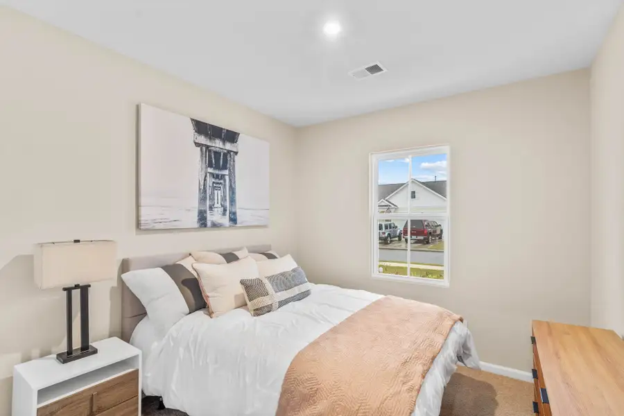 Representative furnished interior of a home built from the The Primrose by Chesapeake Homes in Coastal Club of the Carolinas, Calabash (Image 4).