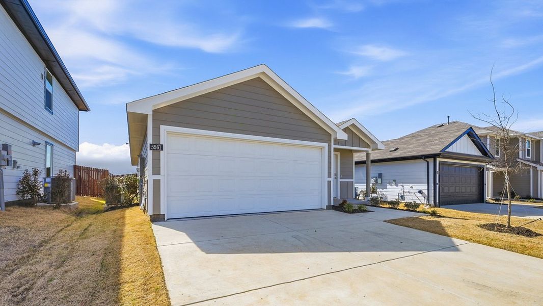 Representative exterior photo of a completed home built from the Caprock by D.R. Horton in Hickory Grove, Krum, TX (Image 22).