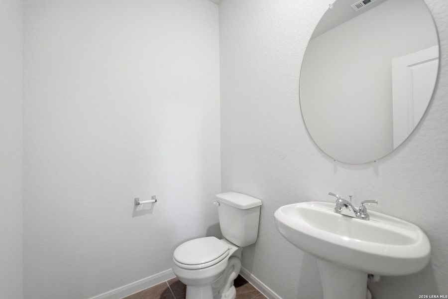 Furnished interior view inside a new home in Hennersby Hollow, San Antonio (Image 13).