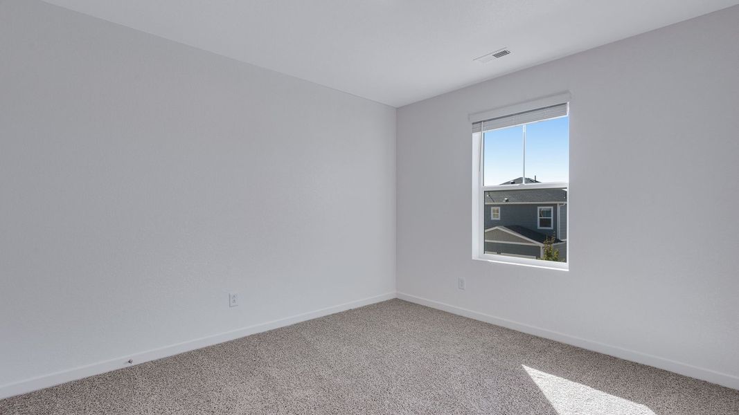 Spacious, unfurnished interior of a new home in Sky Ranch, Watkins (Image 15).