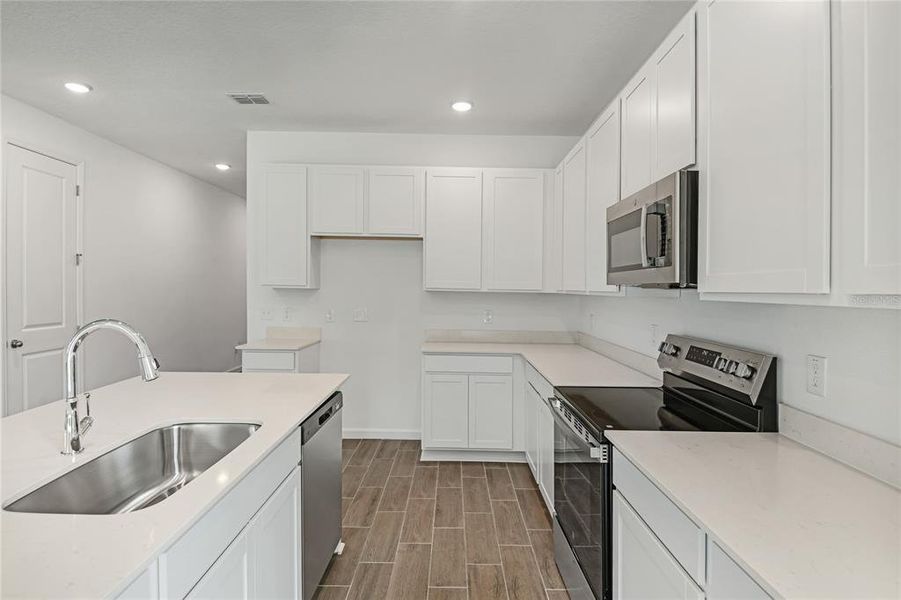 Furnished interior view inside a new home in Seasons at Aurora Oaks, Ocala (Image 9).