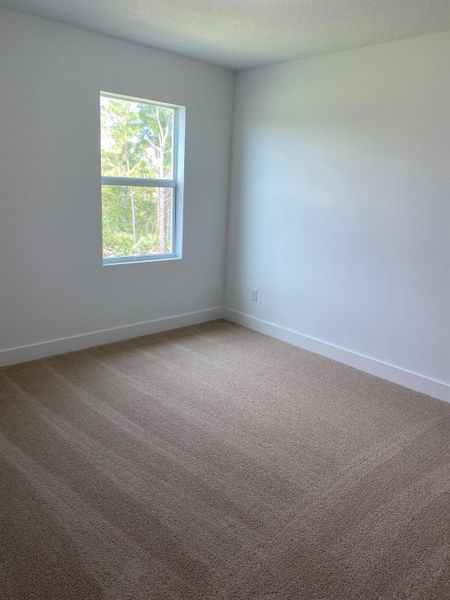 Spacious, unfurnished interior of a new home in Preserves at Park Trace, Stuart (Image 10).