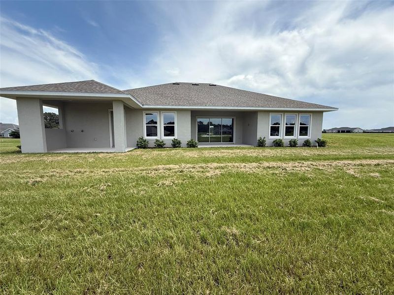 Front exterior of a new home in , Ocala, FL, highlighting curb appeal (Image 7).
