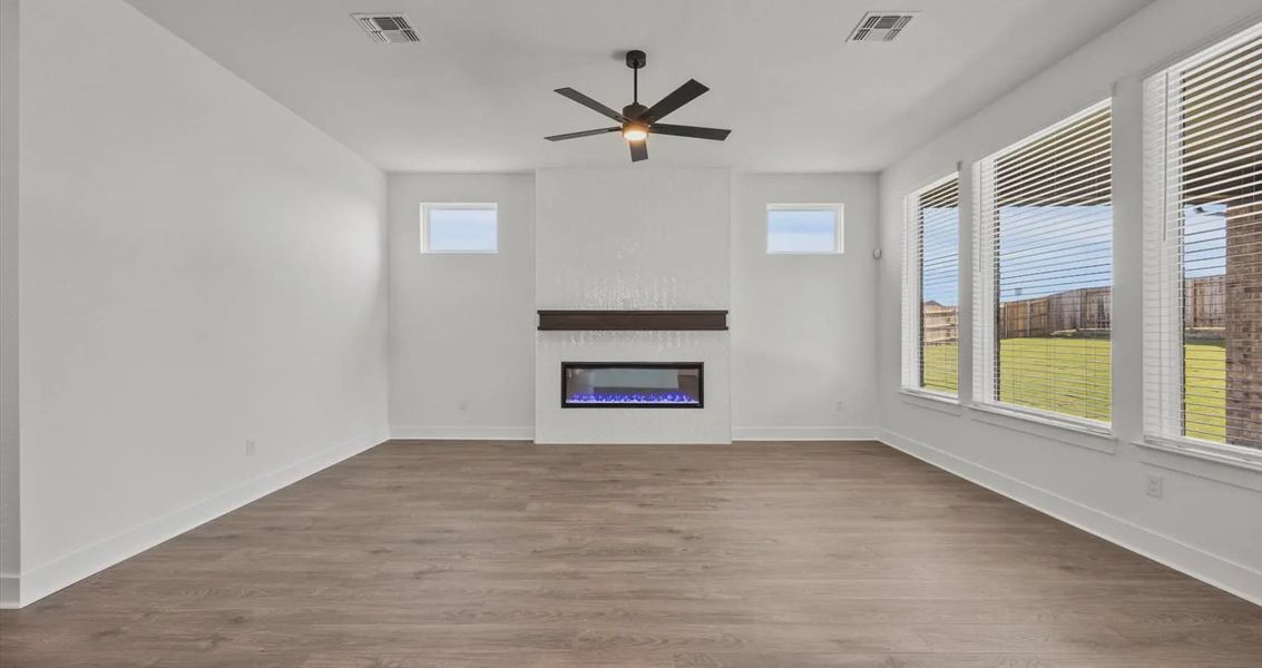Representative unfurnished interior of a home built from the Courtney by Chesmar Homes in Sunfield, Buda (Image 6). Representative unfurnished interior of a home built from the Courtney by Chesmar Homes in Sunfield, Buda (Image 6).