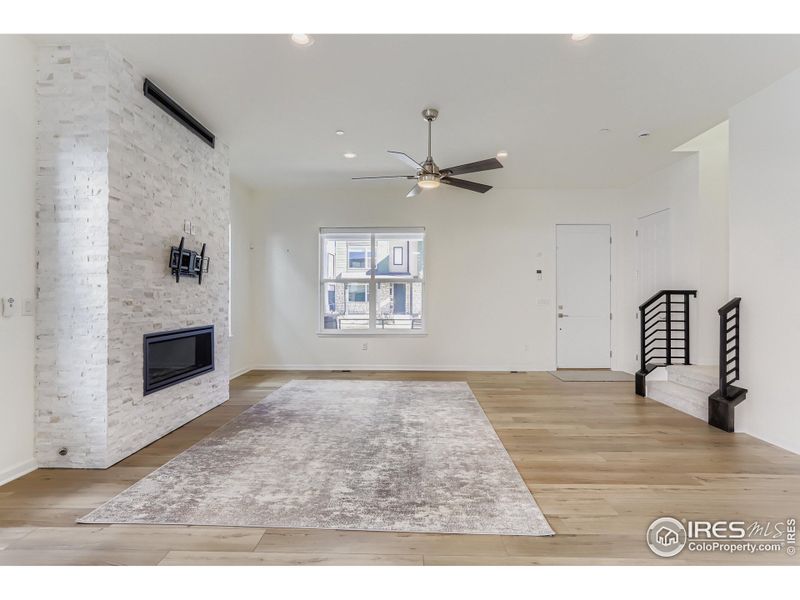 Updated Stack Stone Fireplace with TV Mount