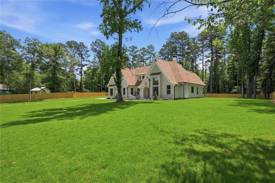 Front exterior of a new home in , Powder Springs, GA, highlighting curb appeal (Image 38). Front exterior of a new home in , Powder Springs, GA, highlighting curb appeal (Image 38).