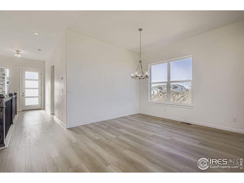 Spacious, unfurnished interior of a new home in RainDance - 60s, Windsor (Image 16).