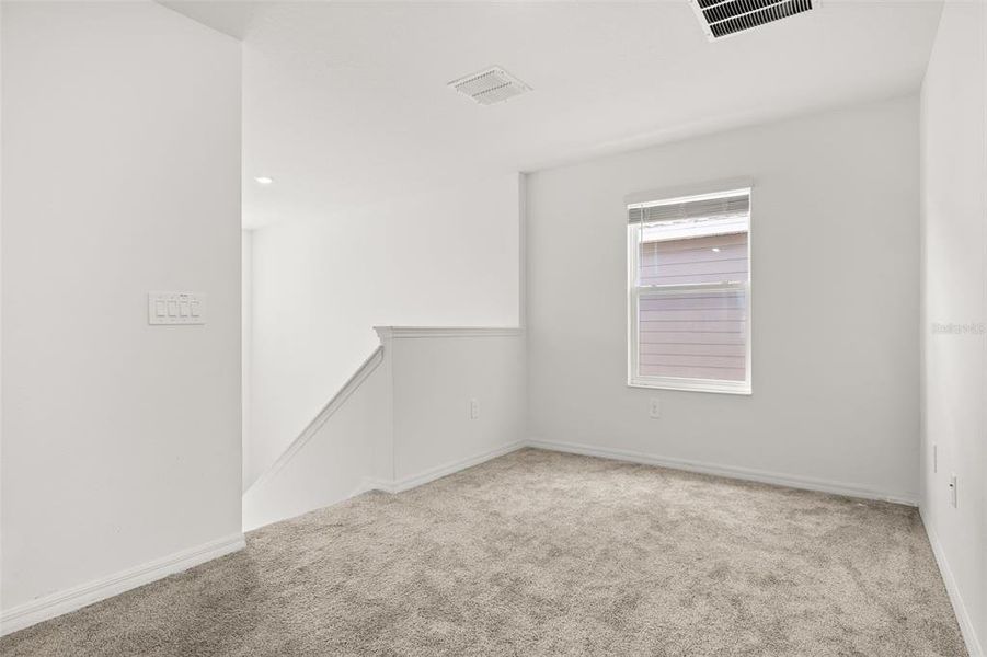 Spacious, unfurnished interior of a new home in Peace Creek Reserve, Winter Haven (Image 25).